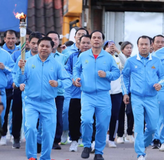 Hadsayfong District Continues Torch Relay for the 12th National Games